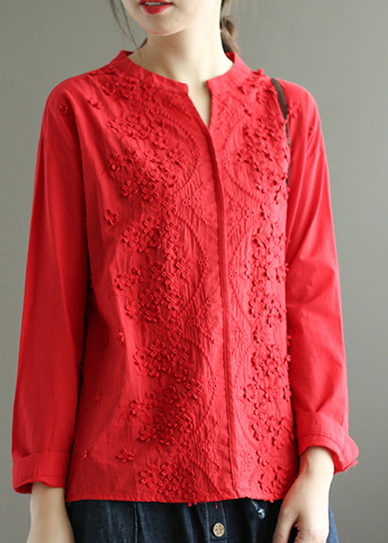 Bonita blusa blanca de algodón liso con cuello en V y bordado floral para primavera