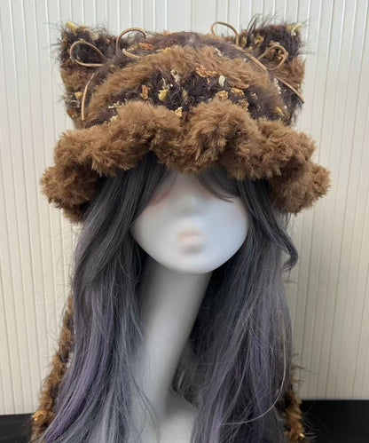Lindo gorro de invierno tejido con retazos de piel peluda y gruesa
