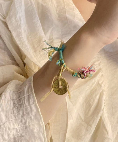 Pulsera con dijes de dinero en cobre de gatito azul tejida a mano DIY