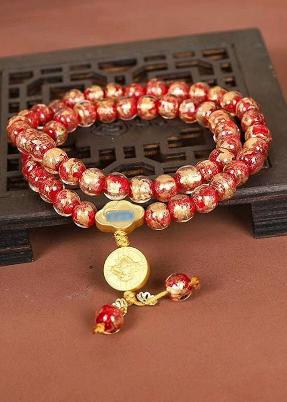 Pulsera DIY con cuentas de Buda esmaltadas en color dorado