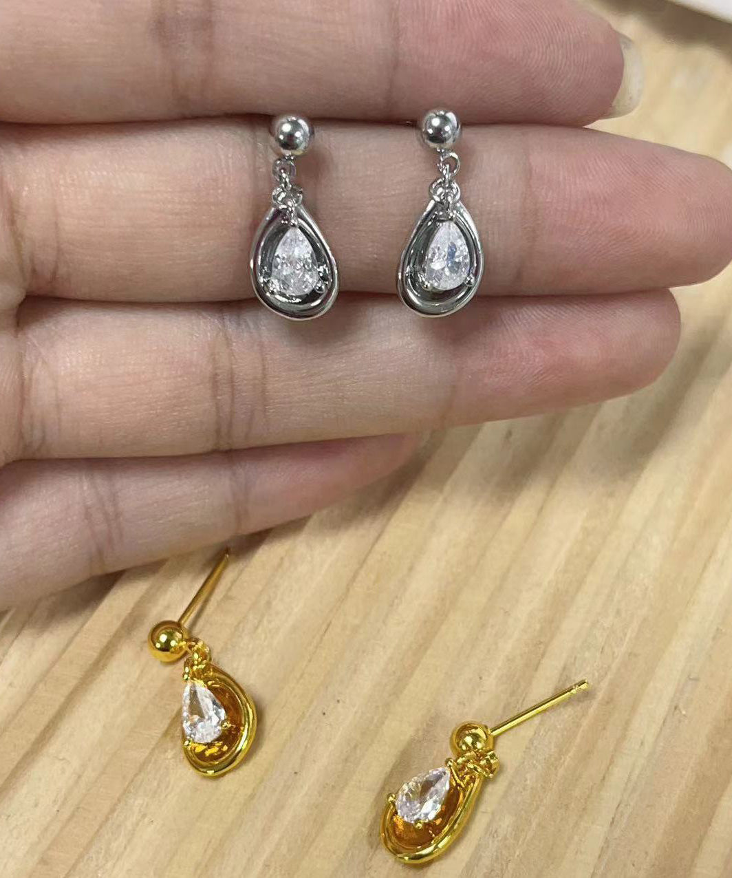 Pendientes de borla con gotas de agua de circonita de aleación de cobre y oro hechos a mano