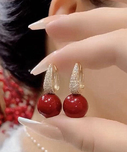 Pendientes colgantes de perla y circonita con sobredorado de cobre rojo hechos a mano