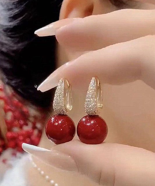 Pendientes colgantes de perla y circonita con sobredorado de cobre rojo hechos a mano