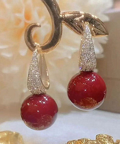 Pendientes colgantes de perla y circonita con sobredorado de cobre rojo hechos a mano