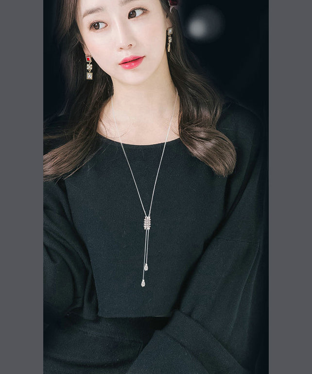 Collar con borlas de faro dorado de seda DIY