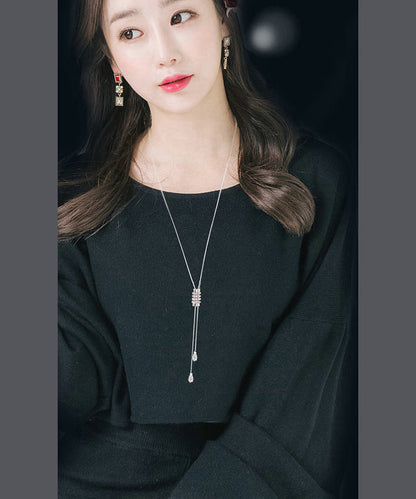 Collar con borlas de faro dorado de seda DIY