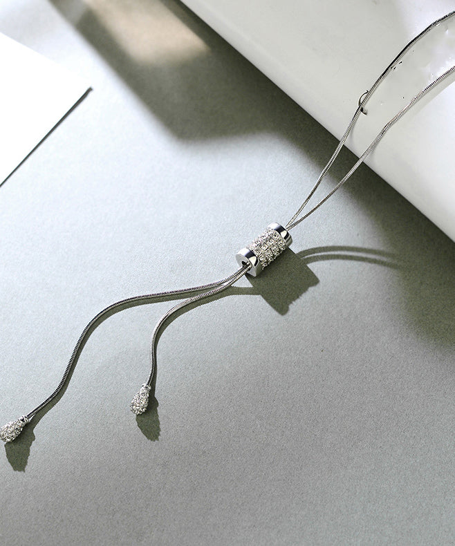 Collar con borlas de faro dorado de seda DIY