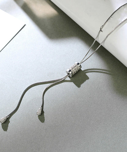 Collar con borlas de faro dorado de seda DIY