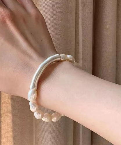 DIY Armband aus weißen Perlen aus Sterlingsilber