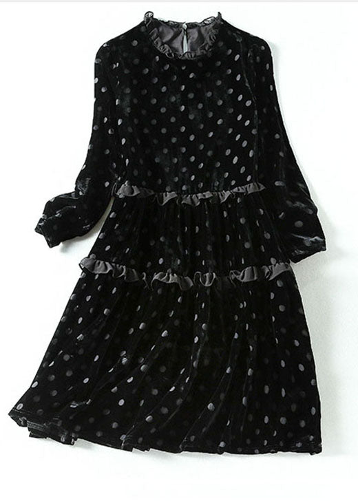 Elegantes schwarzes Patchwork-Velourskleid mit Punktdruck für den Frühling