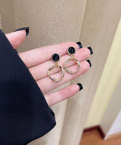 Elegantes pendientes circulares de aleación de plata de ley negra con gotas de aceite.