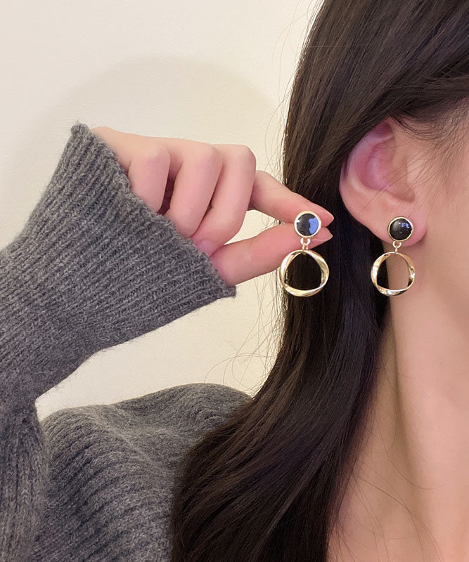 Elegantes pendientes circulares de aleación de plata de ley negra con gotas de aceite.