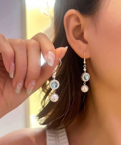 Elegante Ohrringe mit blauer Kupfervergoldung und eingelegten Zirkonia-Kristallperlen und Quasten