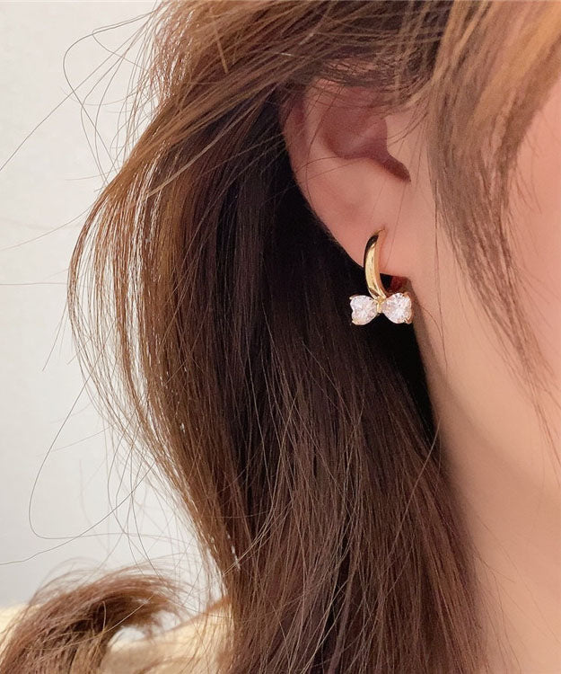 Elegantes pendientes de aro con lazo de cristal y plata de ley dorada