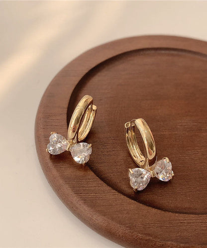 Elegantes pendientes de aro con lazo de cristal y plata de ley dorada