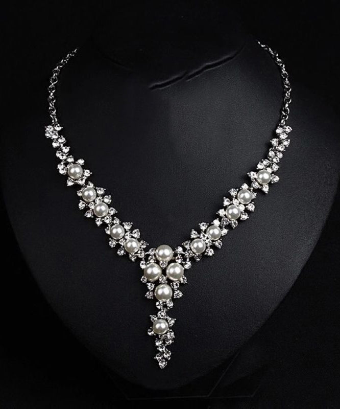 Elegante collar de princesa con perla y circonitas doradas en plata de ley