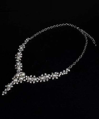 Elegante collar de princesa con perla y circonitas doradas en plata de ley
