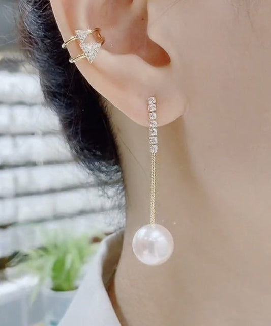 Elegantes pendientes colgantes con borlas de perlas y circonitas doradas en plata de ley