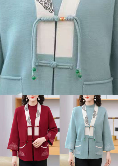 Elegante conjunto de dos piezas de cárdigan y suéter de punto de algodón con borlas y cuello en V en azul claro para primavera.