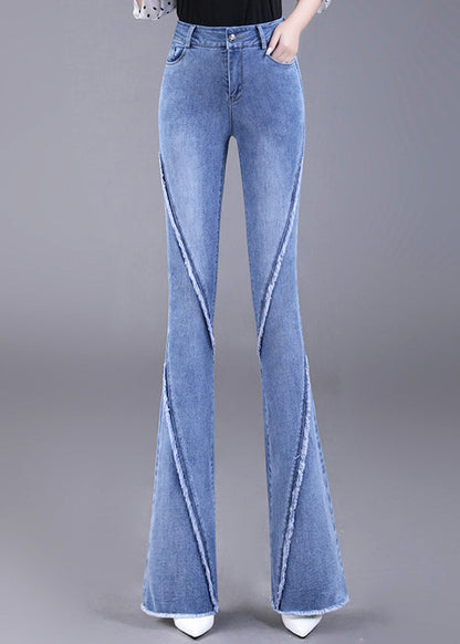 Elegante, marineblaue Patchwork-Jeans mit Quastentaschen und ausgestelltem Schnitt für den Frühling