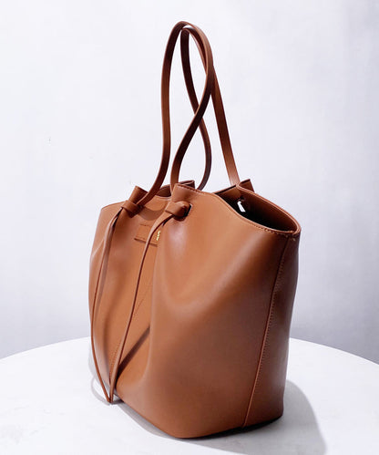 Elegante orangefarbene Damenhandtasche aus Kunstleder mit großem Fassungsvermögen