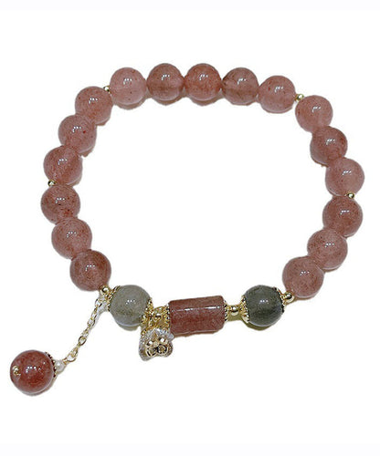 Elegante pulsera con dijes de cuentas de cristal rosa