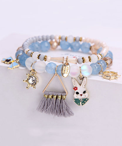 Elegantes lilafarbenes Glasur-Kristall-Delfin-Stern-Charm-Armband