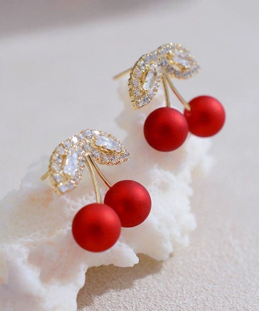 Elegantes pendientes de cereza con circonitas rojas de aleación