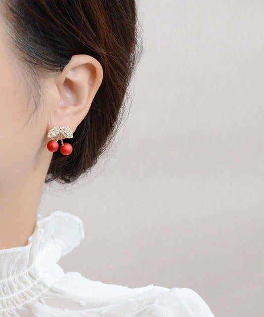 Elegantes pendientes de cereza con circonitas rojas de aleación