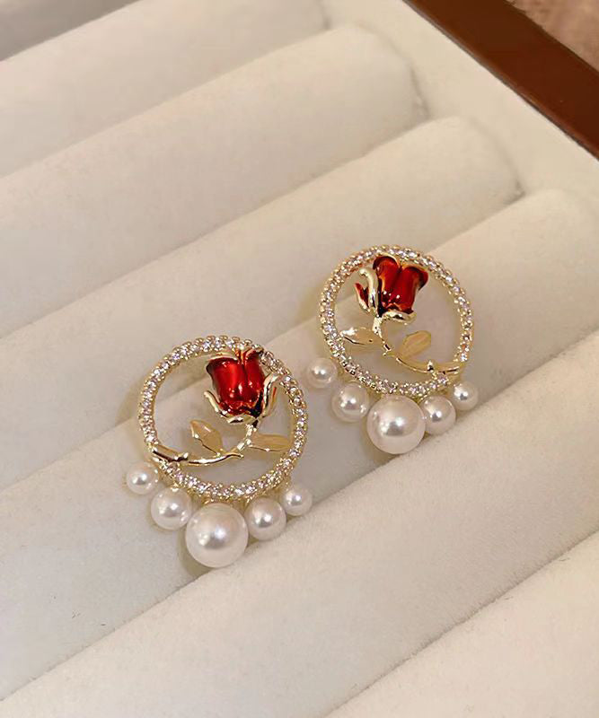 Elegantes pendientes de rosa con perla y circonita de cobre rojo