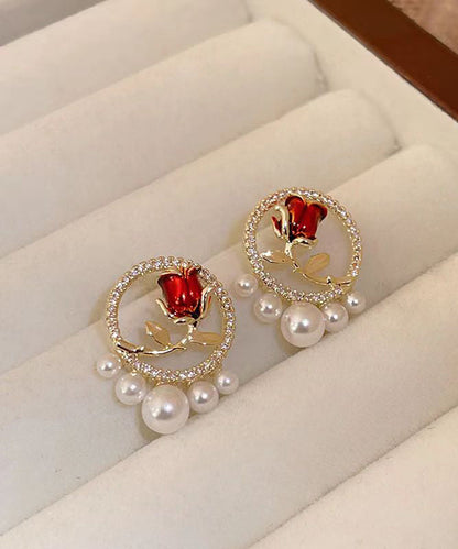Elegantes pendientes de rosa con perla y circonita de cobre rojo