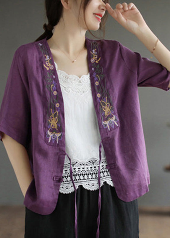 Elegante blusa de lino roja con cuello en V, bordado floral y lazo en la cintura, manga corta