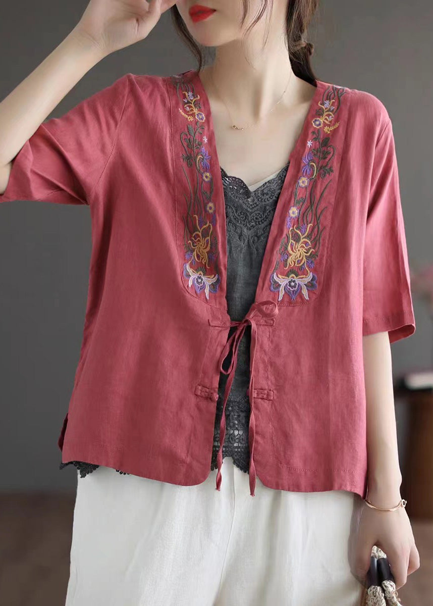 Elegante blusa de lino roja con cuello en V, bordado floral y lazo en la cintura, manga corta