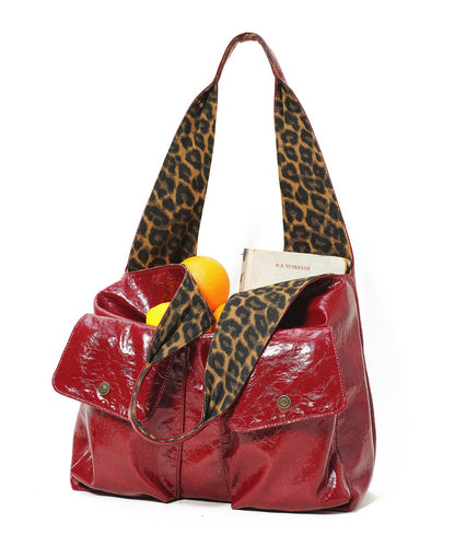 Elegante rote Schultertasche mit Leopardenmuster und Taschen aus Kunstleder
