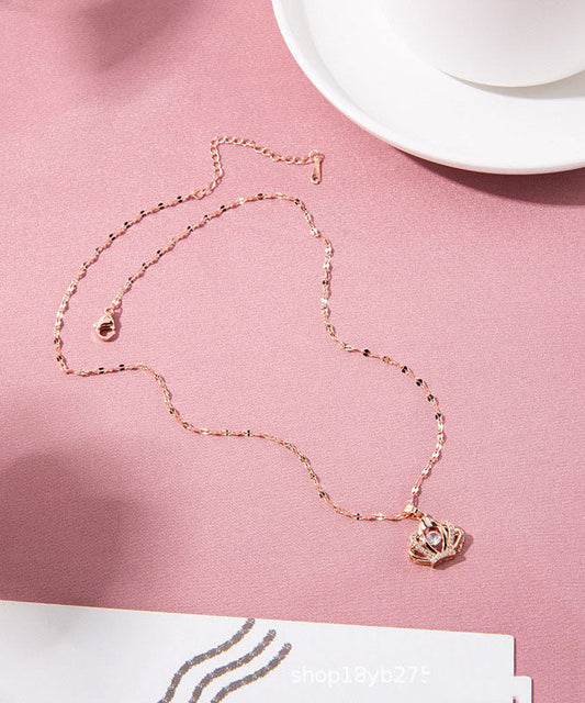 Elegante collar con colgante de corona de oro rosa, cobre y circonitas doradas de 18 quilates