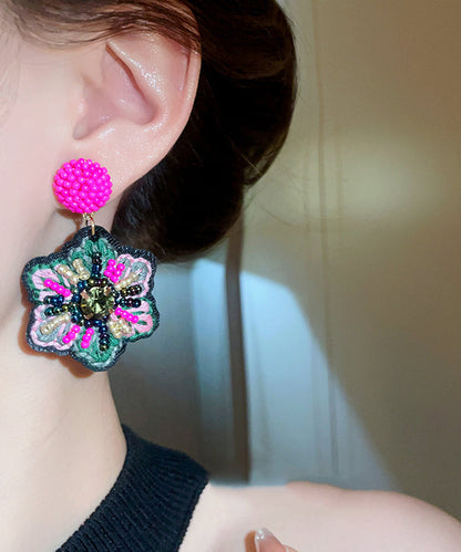 Elegantes pendientes colgantes con flores bordadas y cuentas de aleación tejidas a mano en forma de rosa