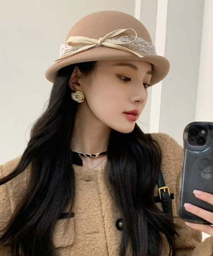Eleganter weißer Woll-Bucket-Hat mit Schleife