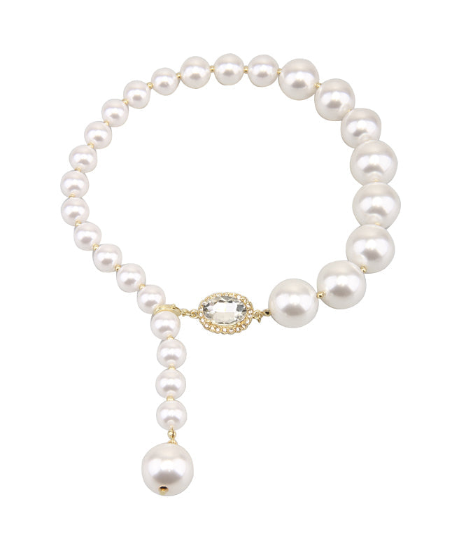 Elegante collar con colgante de perla dorada de cobre blanco