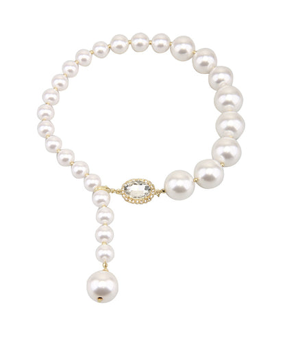 Elegante collar con colgante de perla dorada de cobre blanco