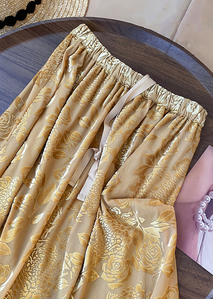 Faldas elegantes de algodón con cordón y estampado amarillo para primavera