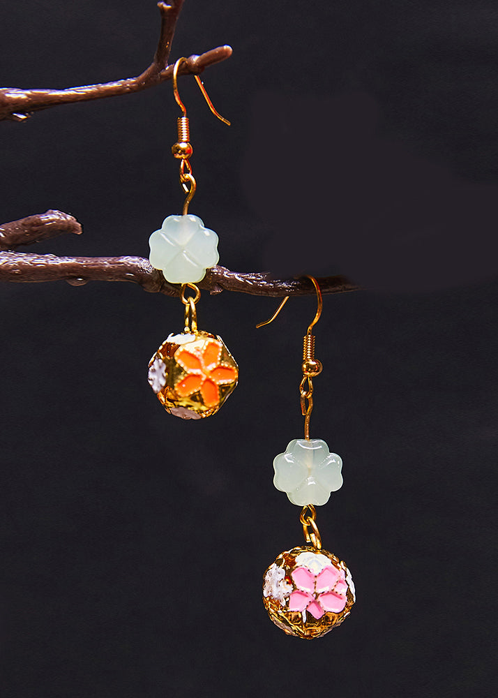 Pendientes colgantes circulares de oro de 14 quilates con diseño asimétrico de moda