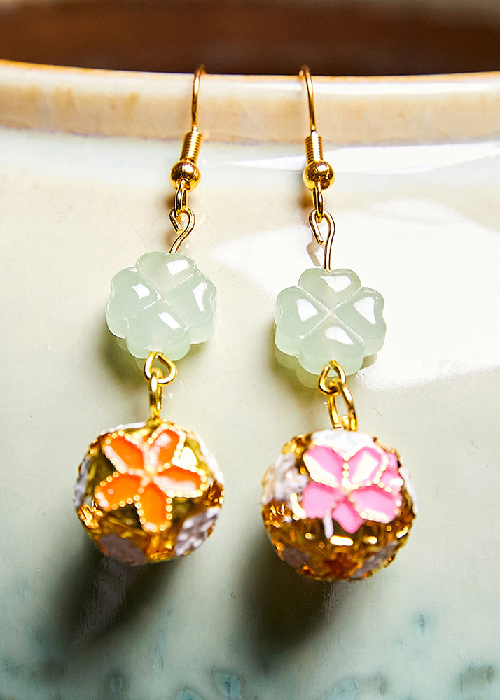 Pendientes colgantes circulares de oro de 14 quilates con diseño asimétrico de moda