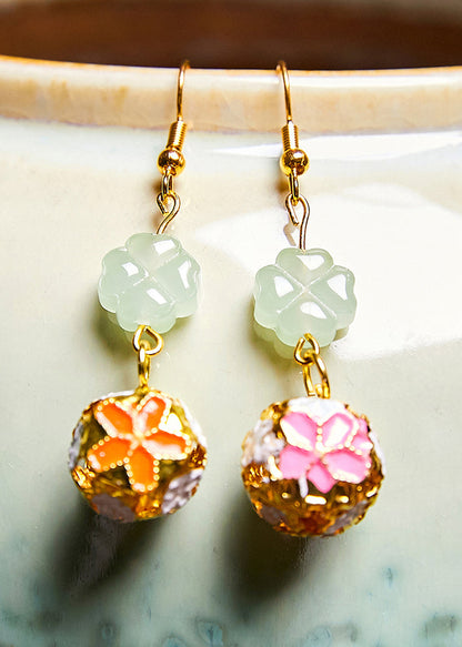 Pendientes colgantes circulares de oro de 14 quilates con diseño asimétrico de moda