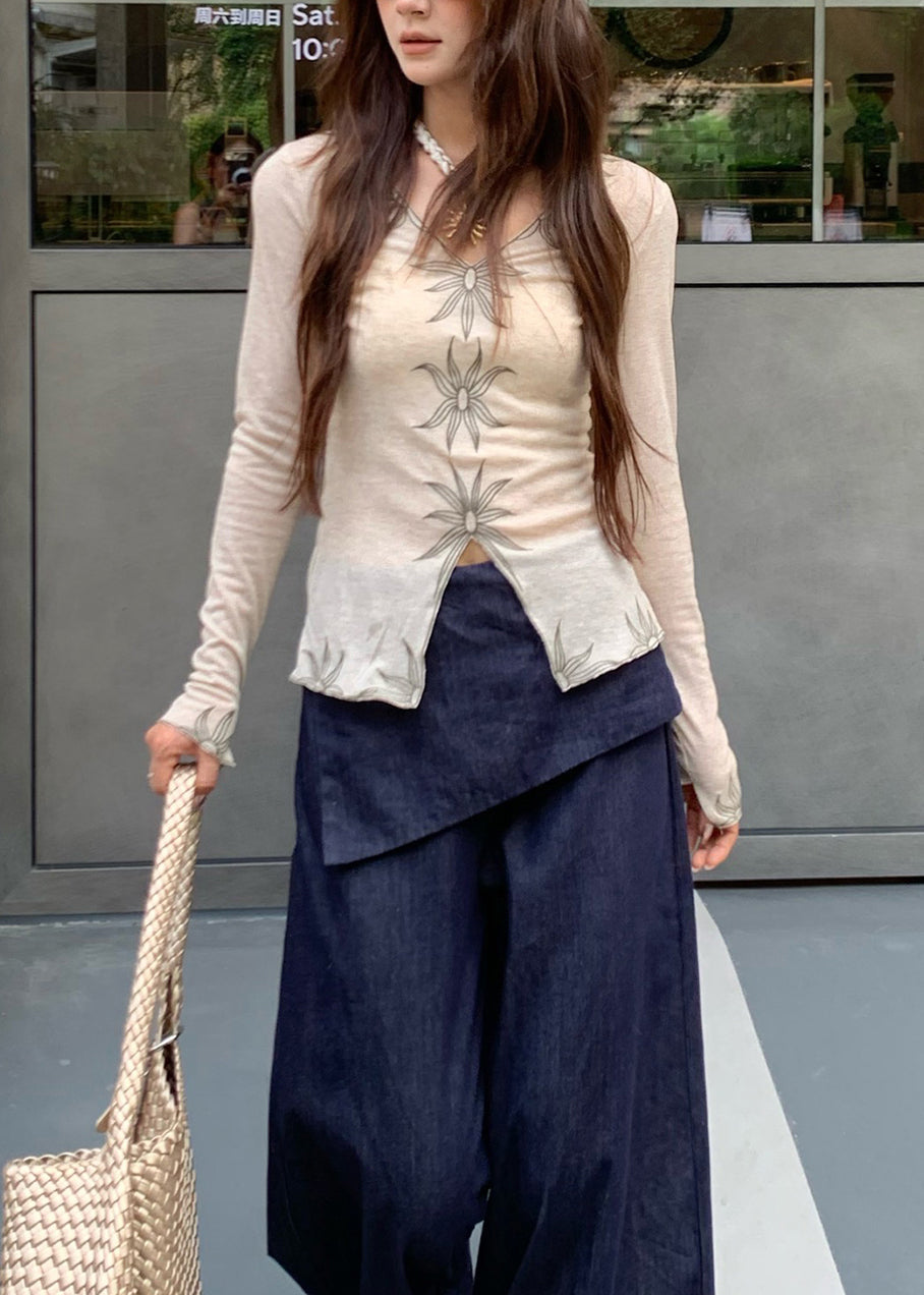 Top de algodón bordado con cuello en V beige de moda para primavera