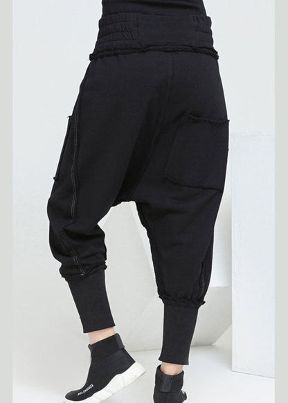 Modische schwarze Haremshose mit Taschen und elastischer Taille