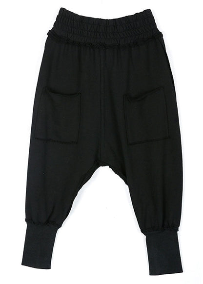 Modische schwarze Haremshose mit Taschen und elastischer Taille