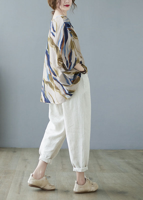 Modisches, blaues, gestreiftes Oberteil mit Fledermausflügelärmeln und V-Ausschnitt und asymmetrischem Design