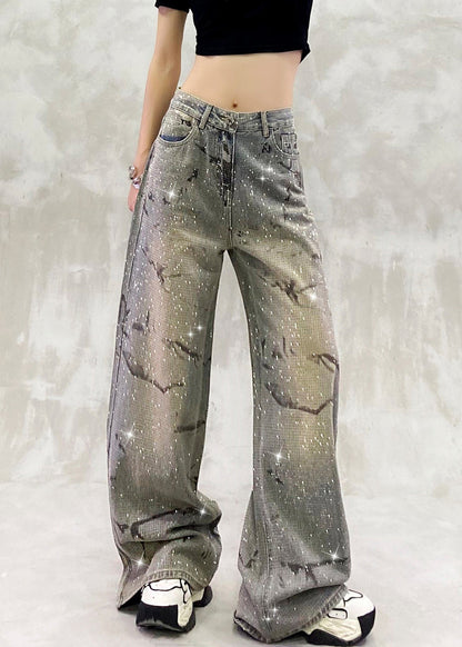 Pantalones vaqueros de cintura alta con bolsillos azules y circonitas de moda para primavera.