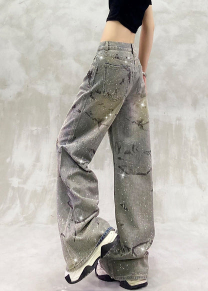 Pantalones vaqueros de cintura alta con bolsillos azules y circonitas de moda para primavera.