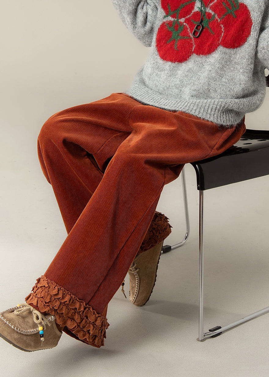 Pantalones rectos de pana oversize con volantes en rojo ladrillo de moda para primavera